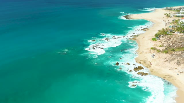 MARQUIS LOS CABOS BCS MEXICO-2021: Ocean Waves Crashing on Rocky Shore and Sandy Beach