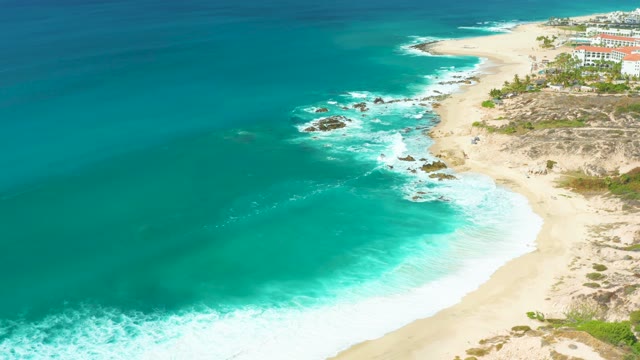 MARQUIS LOS CABOS BCS MEXICO-2021: Waves Crashing on Sandy Beach Coastline