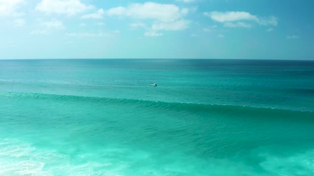 MARQUIS LOS CABOS BCS MEXICO-2021: Surfer Riding a Forming Ocean Wave From Above