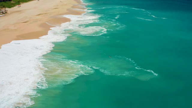 DREAMS LOS CABOS BCS MEXICO-2021: Ocean Waves Crashing on Sandy Beach From Above