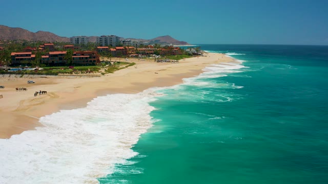 DREAMS LOS CABOS BCS MEXICO-2021: Ocean Waves Breaking on Sandy Shore