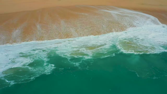DREAMS LOS CABOS BCS MEXICO-2021: Waves Receding on Sandy Beach From Overhead