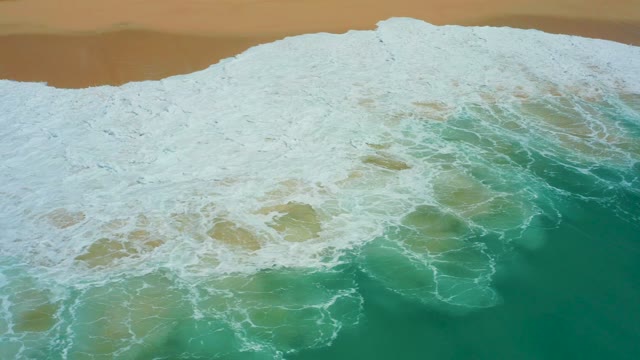 DREAMS LOS CABOS BCS MEXICO-2021: Waves Rolling Onto a Sandy Beach