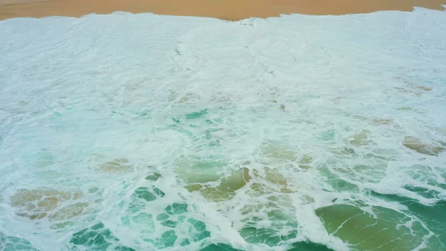 DREAMS LOS CABOS BCS MEXICO-2021: Waves Crashing on Sandy Shore From Above
