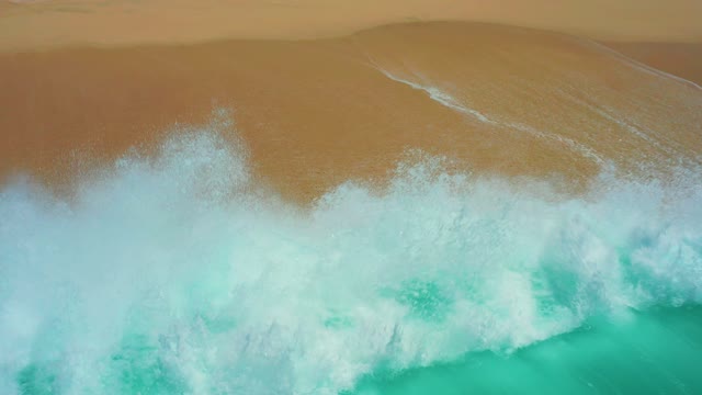 DREAMS LOS CABOS BCS MEXICO-2021: Waves Crashing Onto Sandy Shore