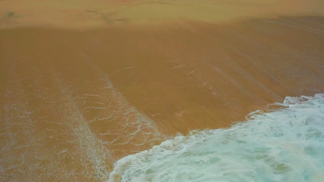 DREAMS LOS CABOS BCS MEXICO-2021: Waves Gently Lapping on Sandy Shore