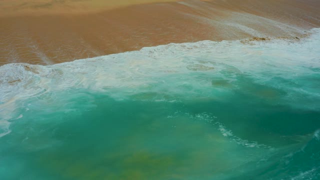 DREAMS LOS CABOS BCS MEXICO-2021: Turbulent Ocean Wave Breaking on Sandy Shore