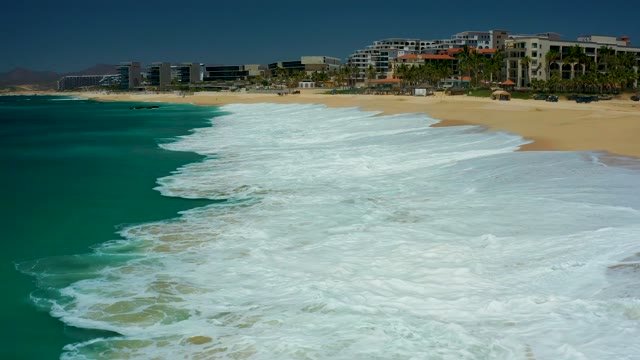 DREAMS LOS CABOS BCS MEXICO-2021: Waves Rolling In On Sandy Shore