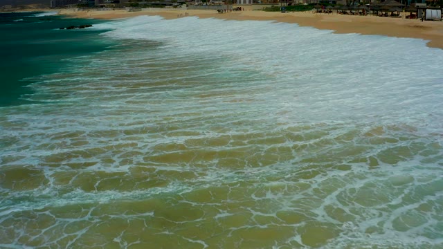 DREAMS LOS CABOS BCS MEXICO-2021: Waves Crashing on Sandy Shore From Above