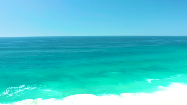 DREAMS LOS CABOS BCS MEXICO-2021: Gentle Ocean Waves Breaking on Shoreline