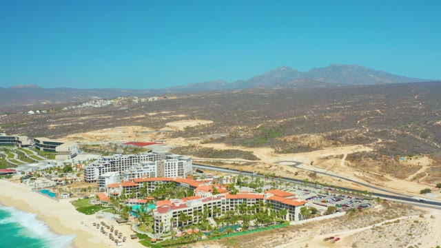 DREAMS LOS CABOS BCS MEXICO-2021: Coastal Resort and Moving Car on Road