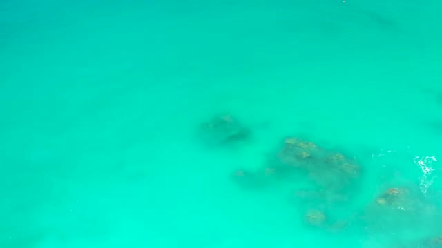 DREAMS LOS CABOS BCS MEXICO-2021: Underwater Scene with Turquoise Water and Rocky Seabed