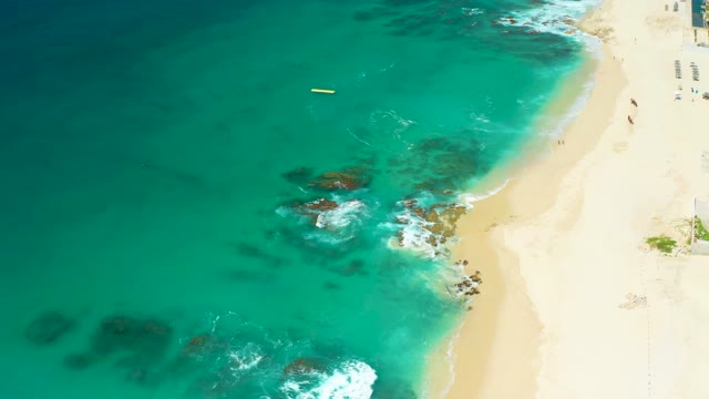 DREAMS LOS CABOS BCS MEXICO-2021: Waves Crashing on Rocky Beach From Above