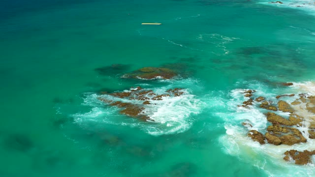 DREAMS LOS CABOS BCS MEXICO-2021: Waves Crashing on Rocky Coastal Shore