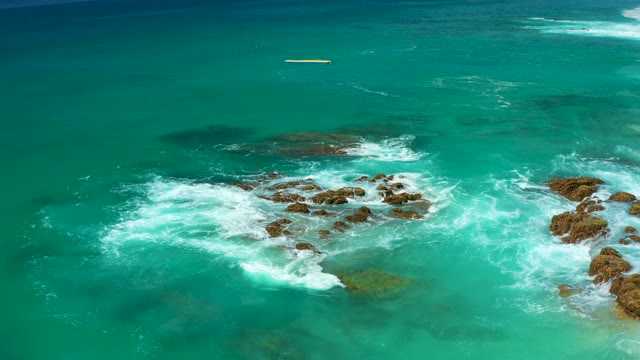 DREAMS LOS CABOS BCS MEXICO-2021: Waves Crashing Against Rocky Ocean Shore