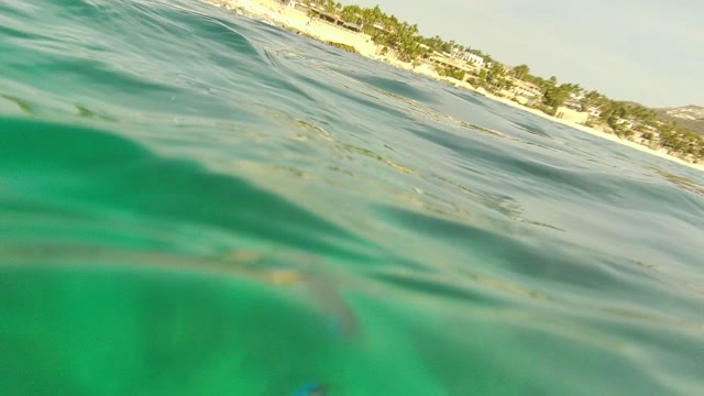 PALMILLA LOS CABOS BCS MEXICO-2021: Clear Ocean Water with Seabed and Distant Shoreline