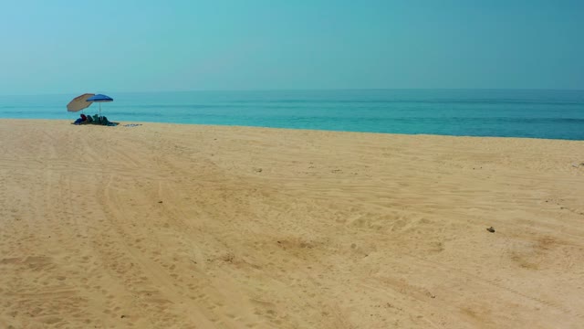 SHIPWRECKS LOS CABOS BCS MEXICO-2021: Beach with Umbrella and Car Approaching