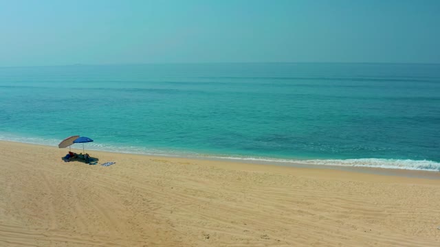 SHIPWRECKS LOS CABOS BCS MEXICO-2021: Sandy Beach with Blue Umbrella and Ocean Waves