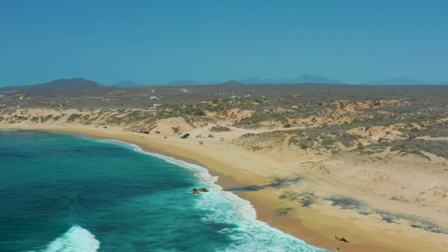 SHIPWRECKS LOS CABOS BCS MEXICO-2021: Waves Rolling Onto Sandy Beach with Dunes