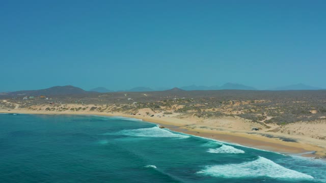 SHIPWRECKS LOS CABOS BCS MEXICO-2021: Waves Breaking on Sandy Coast with Distant Hills