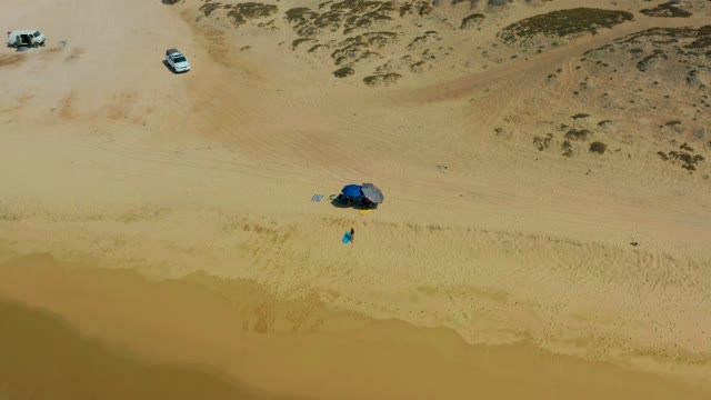 SHIPWRECKS LOS CABOS BCS MEXICO-2021: Sandy Beach with Tent, Vehicles, and Person