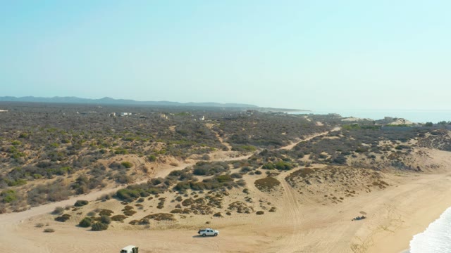 SHIPWRECKS LOS CABOS BCS MEXICO-2021: SUVs Driving on Coastal Dune Road