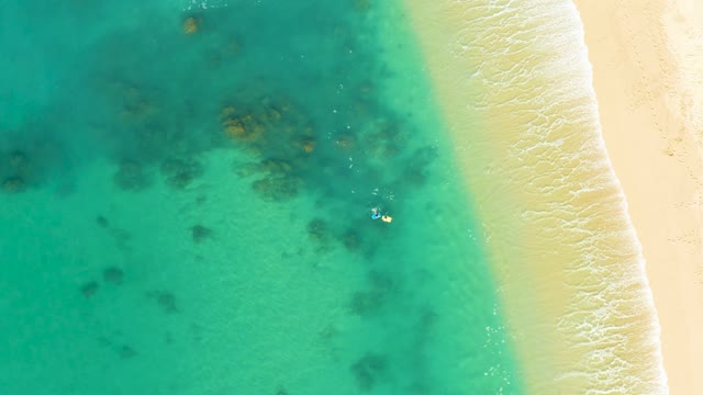 SHIPWRECKS LOS CABOS BCS MEXICO-2021: Swimmer in Turquoise Water and Beachgoer on Shore