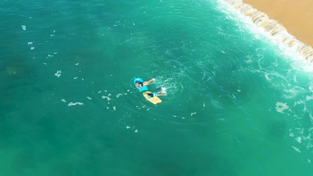 SHIPWRECKS LOS CABOS BCS MEXICO-2021: Person Bodyboarding in Clear Ocean Water