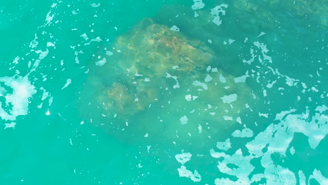 MARQUIS LOS CABOS MEXICO-2021: Clear Turquoise Water Over Submerged Rock Formation
