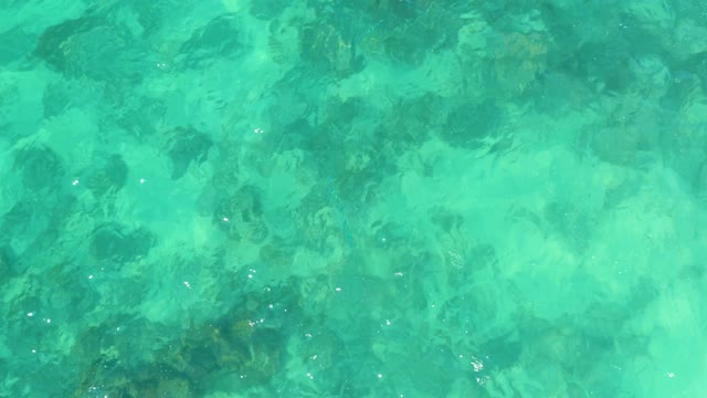 MARQUIS LOS CABOS MEXICO-2021: Clear Turquoise Water over Rocky Seabed