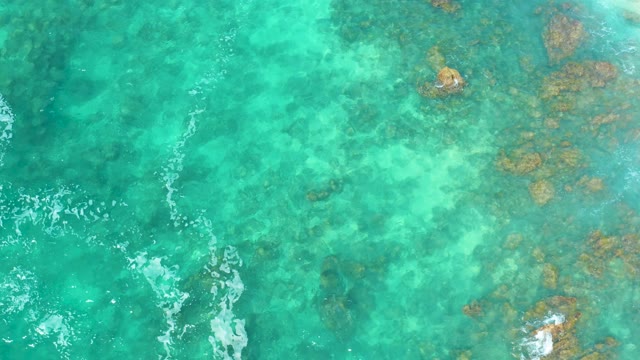 MARQUIS LOS CABOS MEXICO-2021: Gentle Waves over Clear Turquoise Ocean Floor