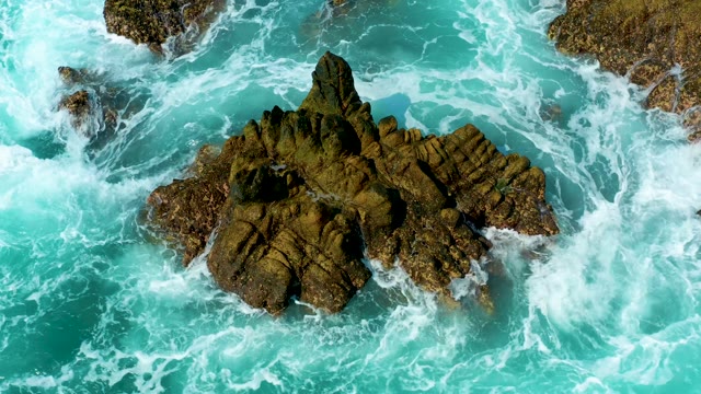 MARQUIS LOS CABOS MEXICO-2021: Waves Crashing on Rocky Ocean Formation