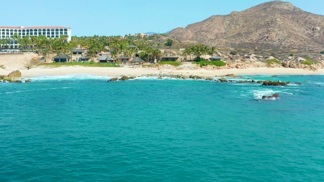 MARQUIS LOS CABOS MEXICO-2021: Waves Hitting Rocky Beach From Above