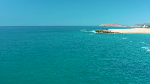 MARQUIS LOS CABOS MEXICO-2021: Waves Lapping Sandy Shore From Above