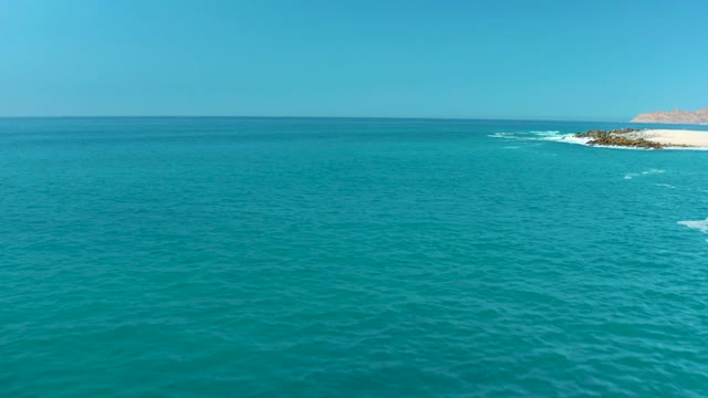 MARQUIS LOS CABOS MEXICO-2021: Waves Crashing on Rocky Coastline From Above