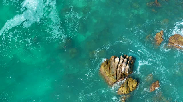 MARQUIS LOS CABOS MEXICO-2021: Waves Crashing Against Rocky Ocean Outcrops