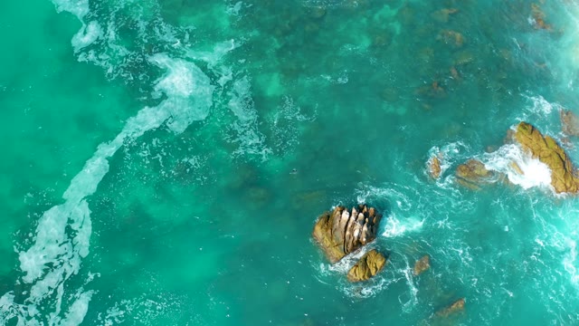 MARQUIS LOS CABOS MEXICO-2021: Waves Crashing Against Rocky Ocean Outcrops