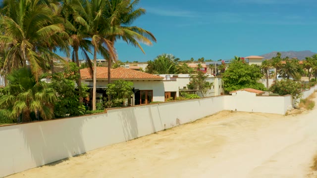 CAMPESTRE SAN JOSE DEL CABO BCS MEXICO-2021: Palm Trees and Residential Area with Moving Clouds