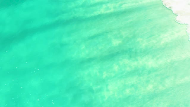CAMPESTRE SAN JOSE DEL CABO BCS MEXICO-2021: Gentle Waves in Shallow Turquoise Coastal Water