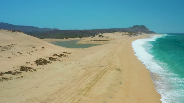 LA LAGUNA BEACH LOS CABOS MEXICO-2021: Sandy Dunes and Lagoon Along Ocean Beach