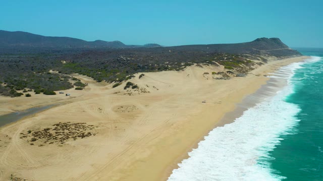 LA LAGUNA BEACH LOS CABOS MEXICO-2021: Sandy Dunes and Ocean Waves Along Coastline