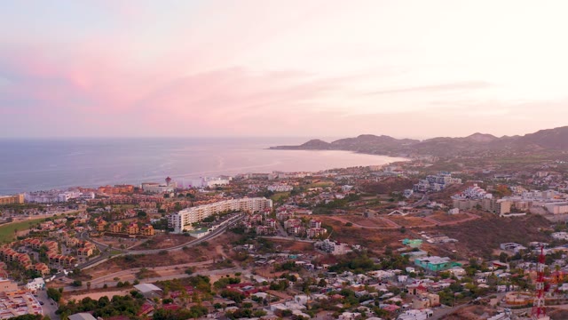 SAN JOSE DEL CABO MEXICO-2021: Coastal Town at Sunset with Ocean and Buildings