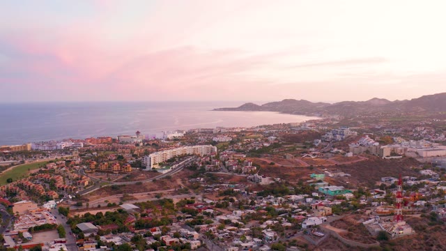 SAN JOSE DEL CABO MEXICO-2021: Coastal Town at Dusk with Moving Structure
