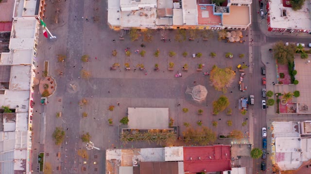 SAN JOSE DEL CABO MEXICO-2021: Town Square with Flag in Rotating Aerial Shot