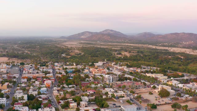 SAN JOSE DEL CABO MEXICO-2021: Small Town with Mountain Backdrop and Greenery