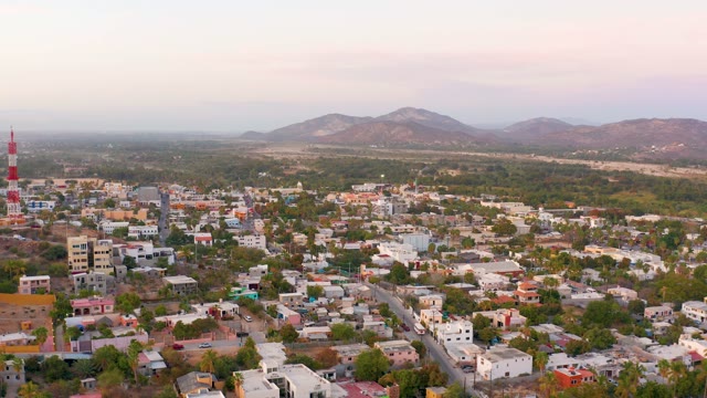 SAN JOSE DEL CABO MEXICO-2021: Residential Town with Distant Mountains and Soft Light