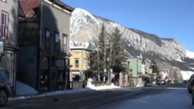 CRESTED BUTTE COLORADO-2015: Snow Covered Mountains And Blue Sky On A Clear Day
