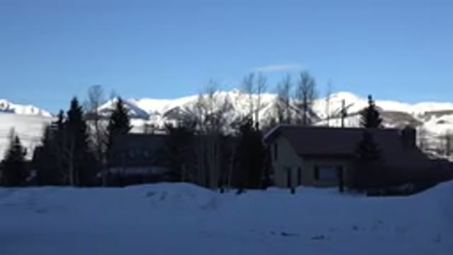 CRESTED BUTTE COLORADO-2015: Snow Covered Mountains Against Blue Sky On A Clear
