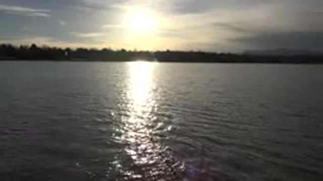 WESTMINSTER COLORADO-2015: Sun Rising And Reflecting On The Lakes Blue Serene