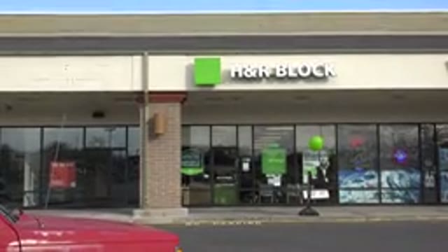 WESTMINSTER COLORADO-2015: Green Balloon Outside Storefront with Red Pickup Truck
